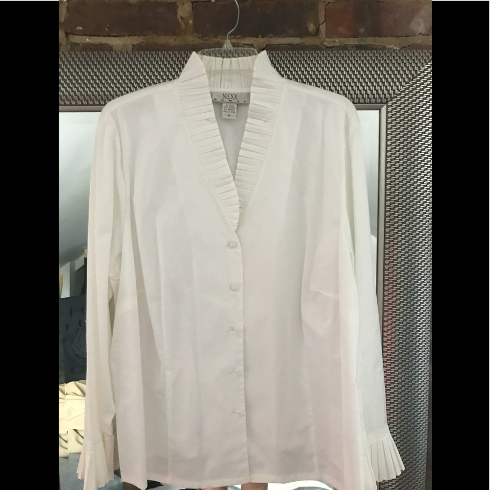 Five button blouse with V-neck and stand up ruffle collar and sleeves.  NWT